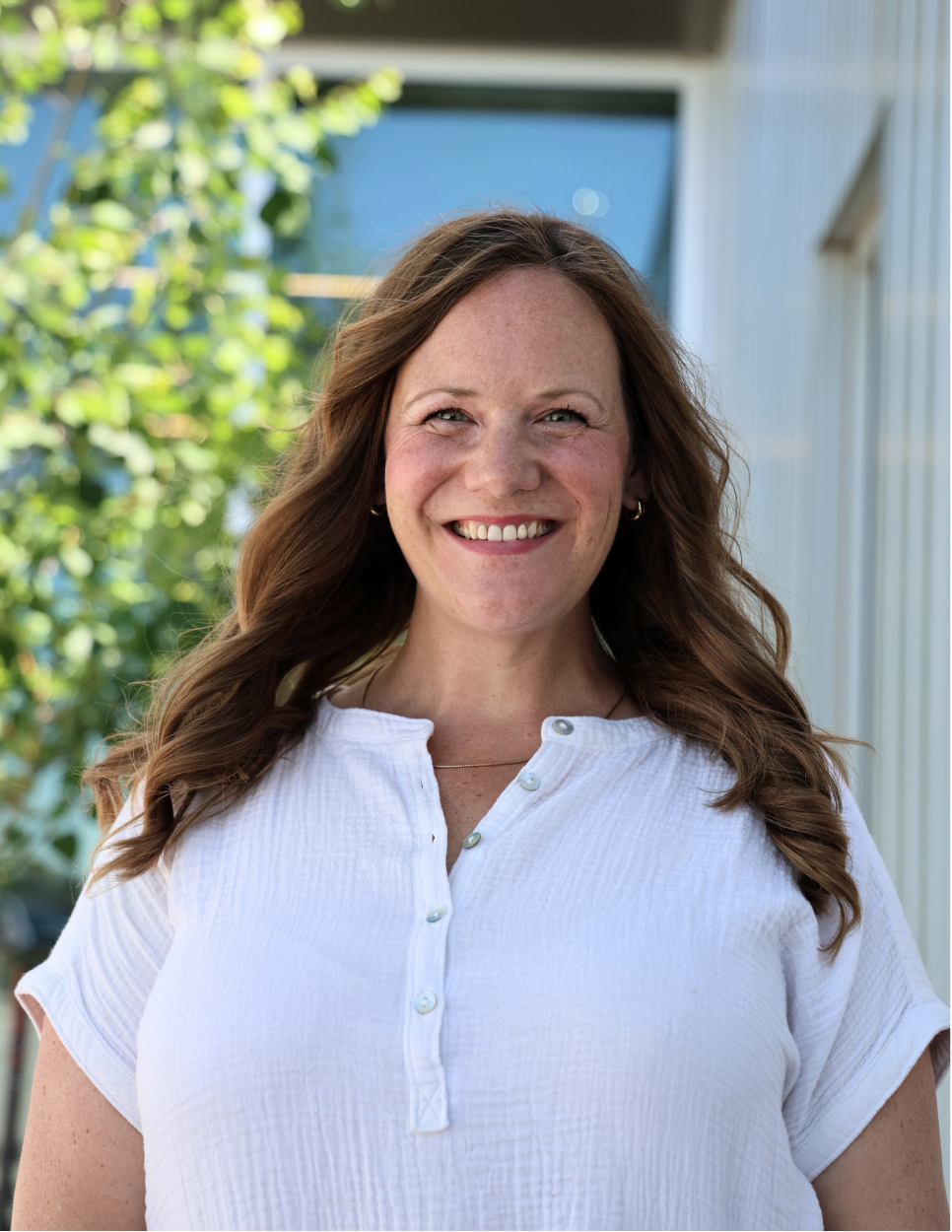 This image shows a photo of Commissioner Emily Secor May.