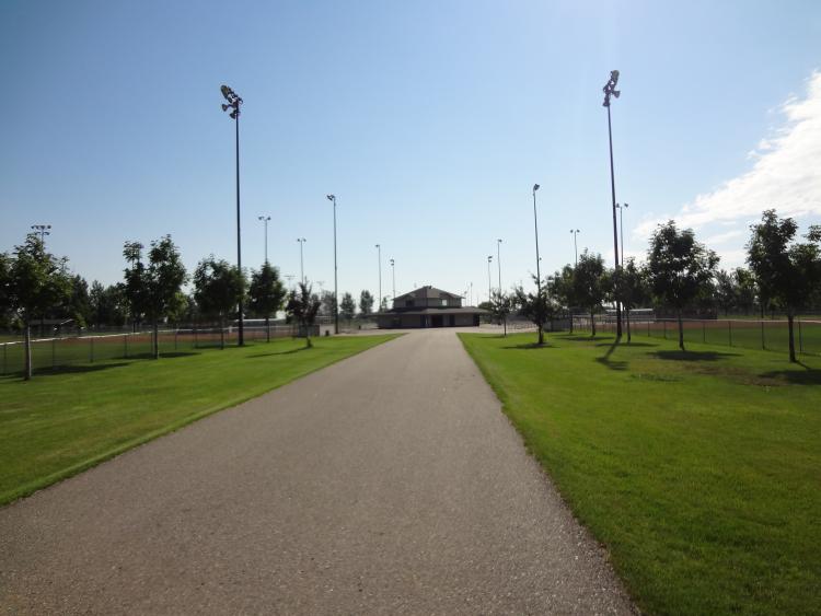 This is the walking path leading to the concession building at Anderson Softball Complex.