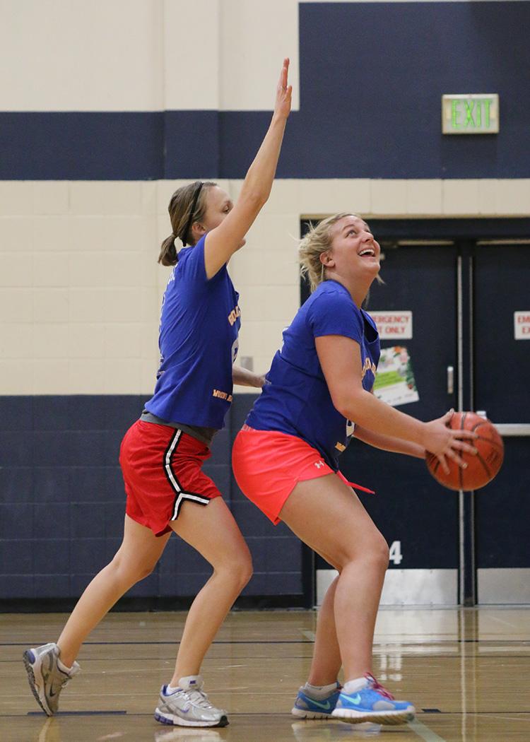 basketballwomens This image shows two females at the adult basketball program.