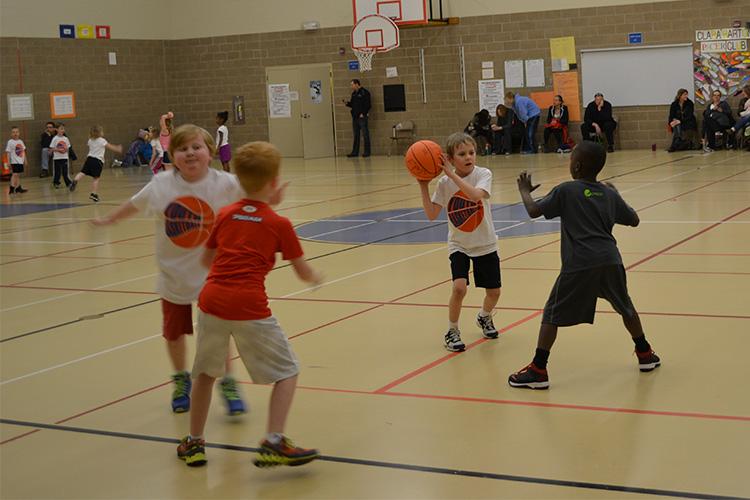 basketballyouth2 This image shows young children on the court at the youth basketball program.