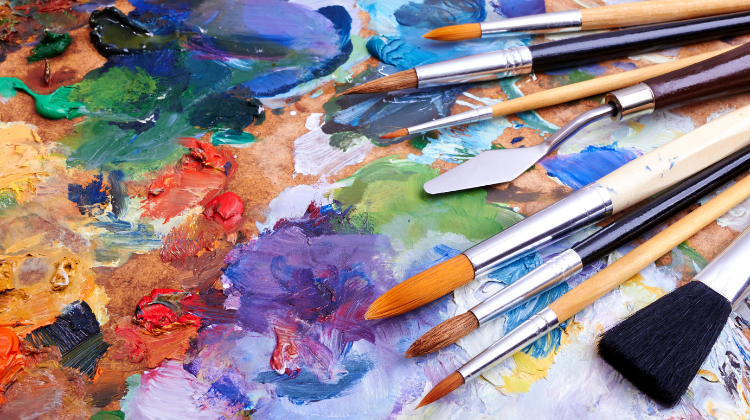 This image shows some paint and paint brushes.