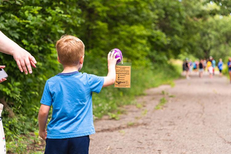 monstrousimagination3 This image shows a boy finding an egg on the walk during Monstrous Imaginaton.