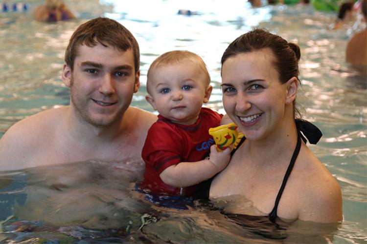 This image shows a family at open swim.
