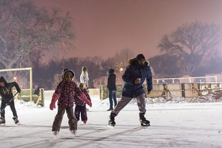 This image shows some people skating around during S'mores and More.