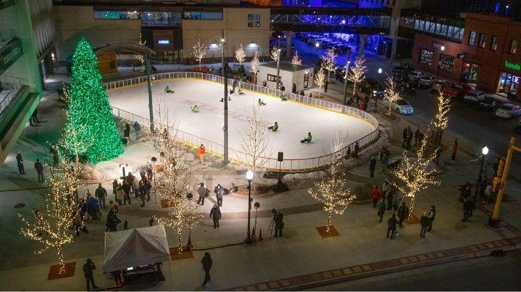 This image shows an aerial view of the Christmas Tree Lighting at Broadway Square.