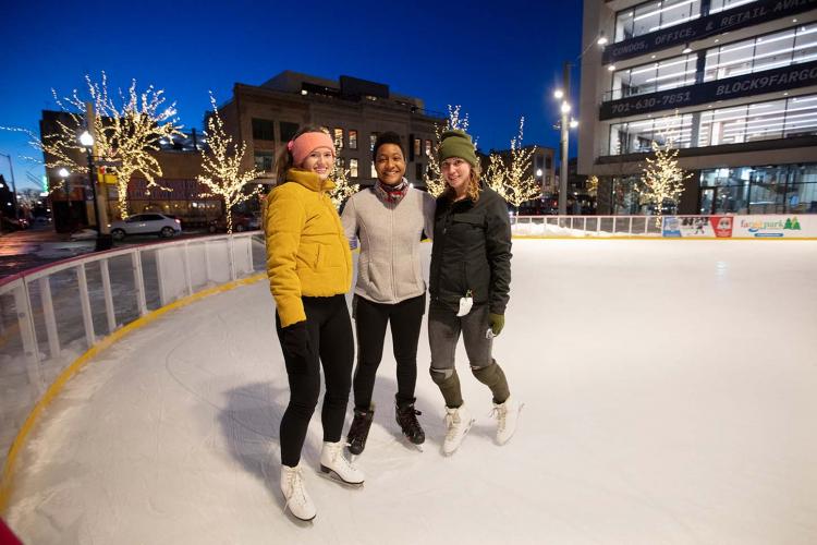 scheelskatingrinkarticlephoto This image shows a photo of people skating on SCHEELS Skating Rink.