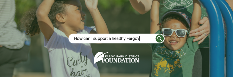 This photo shows 2 kids playing on a playground with the words in a search engine saying how can I support a healthy Fargo?