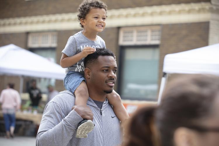 Father and son at Red River Market
