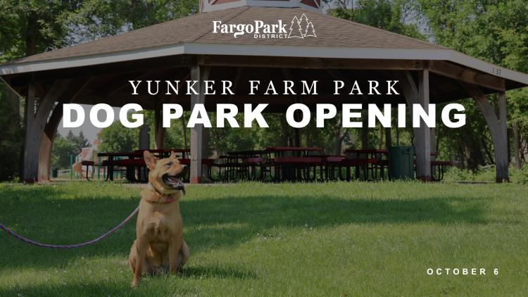 Dog sitting on the grass in front of a wooden pavilion at Yunker Farm Park. Text reads 'Yunker Farm Park Dog Park Opening, October 6' with the Fargo Park District logo at the top.