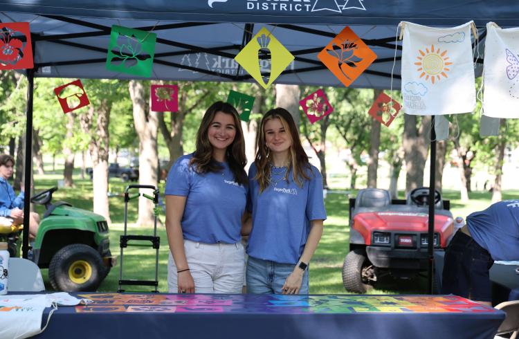 This image shows two interns at Midwest KidFest.