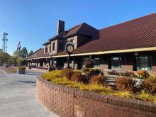 This image shows the front of the Depot in the fall.