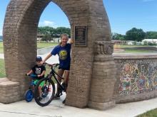 This image shows two kids at Madison Bicycle Playground.