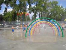 This image shows the splash pad at Madison Pool & Splash Pad.