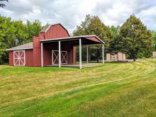 This image shows the barn at Trollwood Park.