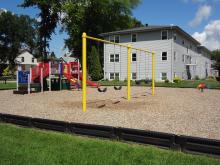 playground equipment in bed of wood chips in Roosevelt Park