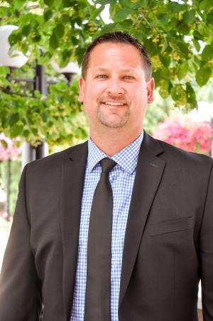 This image shows a headshot of Mike Erickson.