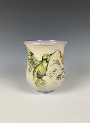 This image shows a hand painted ceramic mug, painted by Annette Marchand.