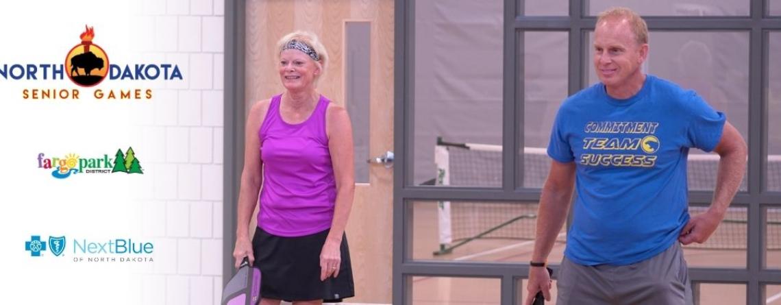 This image shows a male and female participating in North Dakota Senior Games.