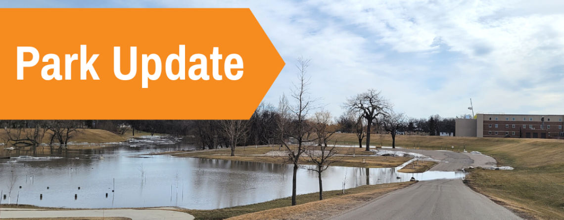 This image shows a graphic of Park Update atop a picture of a flooding park.