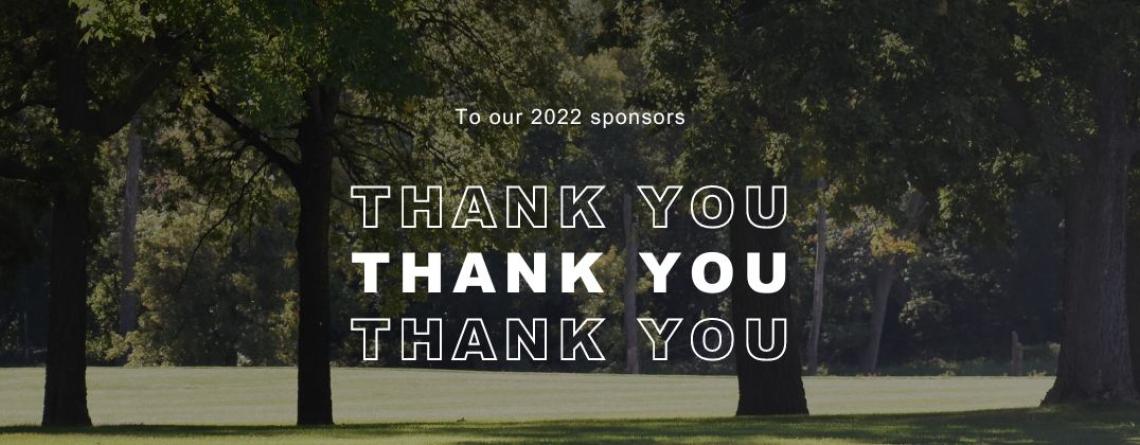 This photo shows trees in a park with the text thank you to our 2022 sponsors