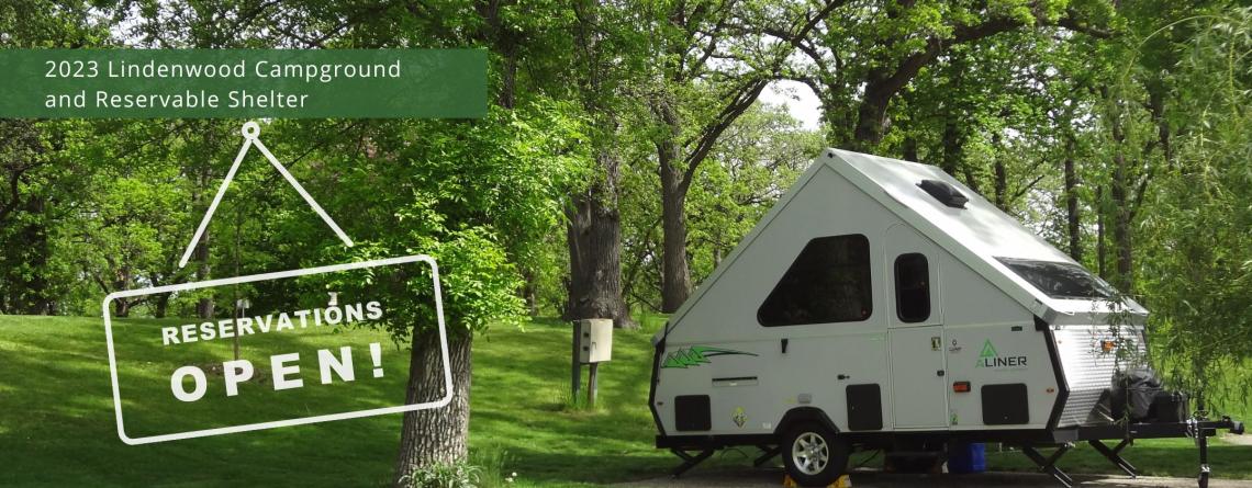 Picture of A-Line Camper in Lindenwood Campground with white text that says "2023 Lindenwood Campground and Reservable Shelter Reservations Now Open