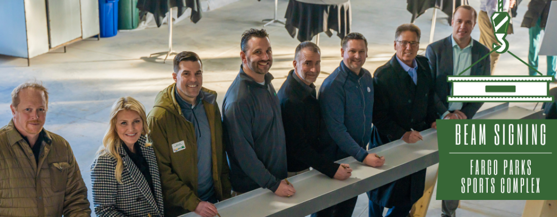 This photo shows the Foundation Board and Park Board signing the final beam at the Fargo Parks Sports Complex