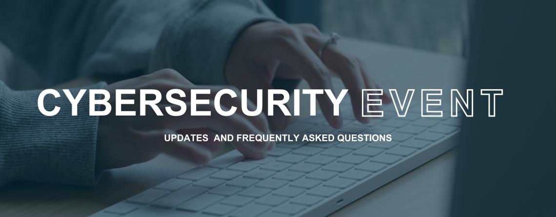 This image shows hands typing at a computer with text that says "cybersecurity event - updates and frequently asked questions"