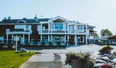 This image shows the front of the Rose Creek clubhouse. 