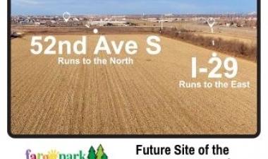 Photo shows aerial of future site of Fargo Sports Complex with 52nd Ave S marked to the North and I-29 marked to the East with the Fargo Parks logo