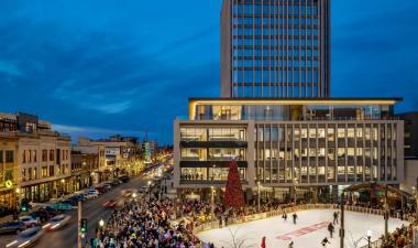 This image shows an aerial view of Broadway Square during the Christmas Tree lighting