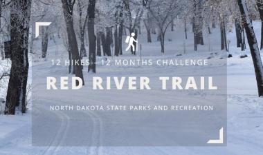 Wintery picture of park trail, with grey box and white text that says 12 Hikes-12 Months Challenge Red River Trail North Dakota State Parks and Recreation