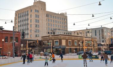 This photo shows people skating at Broadway Square