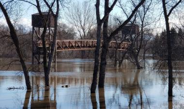 photo of Lindenwood Park bridge with flooding present