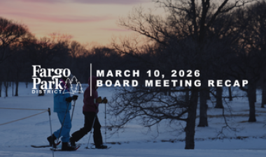 Winter sunset with two snowshoers behind fargo parks logo and board meeting recap title text