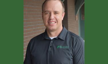 Image of Craig Bjur at the Depot with green color blocks on either side of the image