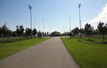 This is the walking path leading to the concession building at Anderson Softball Complex.