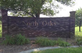 This image shows the sign for North Oaks Park.