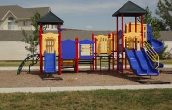 This image shows the playground at Oak Manor Park.