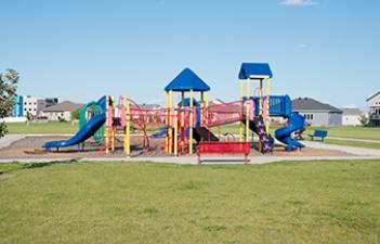 This image shows the playground at Brandt Crossing Park & Dog Park.