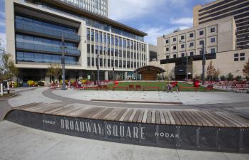 This image shows a street view of Broadway Square