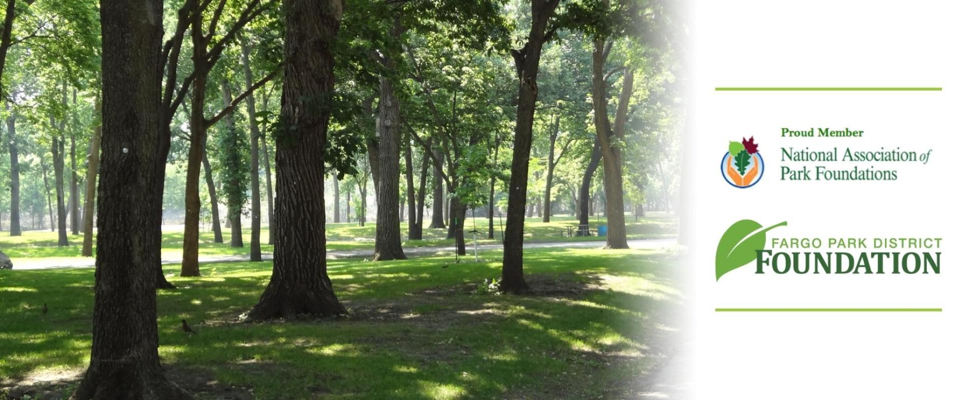 This photo shows Oak Grove Park with trees and a path along with the Fargo Park District Foundation logo and the National Association of Park Foundations logo