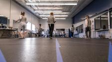 This image shows the fencing room while the adult fencing program is in session.