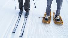 This image shows a cross country skis and snowshoes on a Fargo Parks trail.