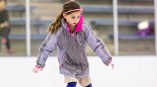 This image shows a girl ice skating.