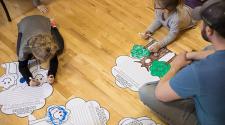 This image shows two kids coloring at Awesome Art Afternoon.