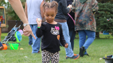 This image shows a girl playing games at Fall in Fargo.