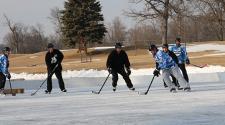 This image shows a game going on at the Fargo Pond Hockey Classic.