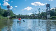 This photo shows a boy kayaking at Lindenwood Park.