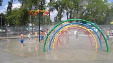 This image shows the splash pad at Madison Pool & Splash Pad.