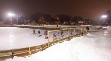 This image shows two outdoor ice rinks with people skating on them.